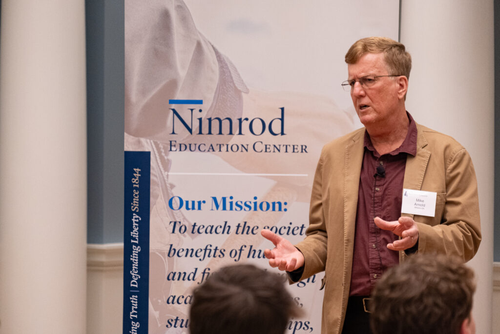 Dr. Mike Arnold delivers a lecture on the importance of hunting in conservation for the Nimrod Education Center in the Hoynak Room on April 3, 2024.